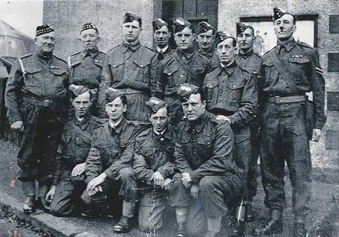 WW1 soldiers pose for a photograph outside the Drill Hall circa 1910